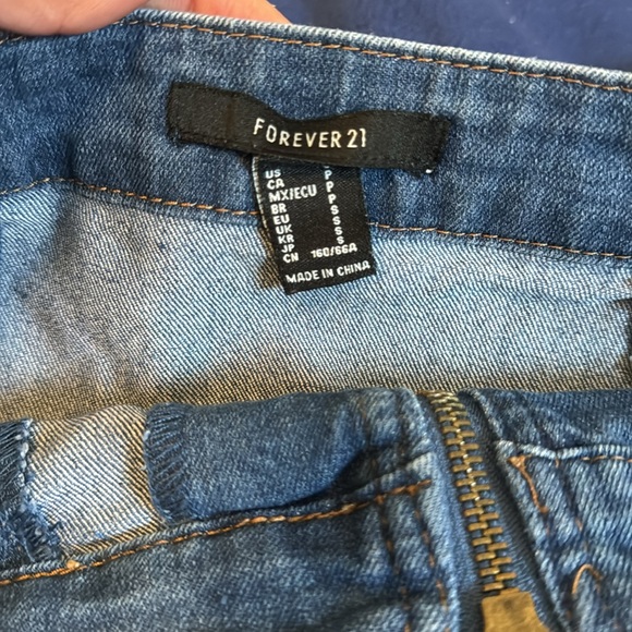 this is a mini skirt, blue jeans, brand forever21, and size small - Picture 3 of 3